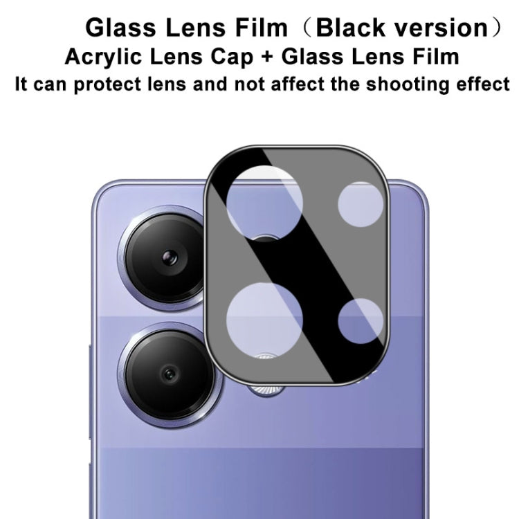 Black integrated glass lens film applied over dual rear camera lenses on a phone