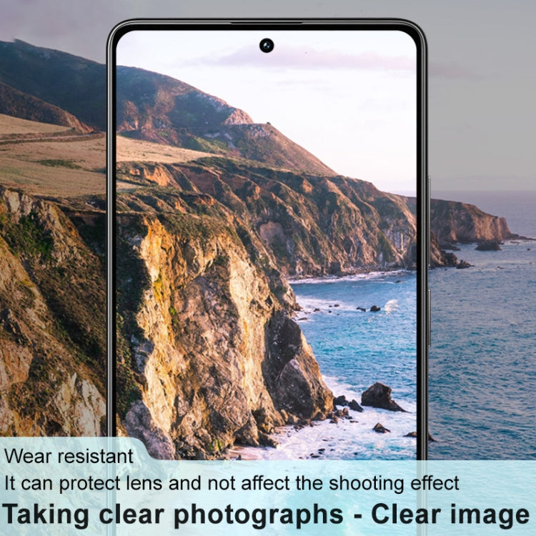 Phone with black glass lens film on rear camera area for clearer, protected lenses