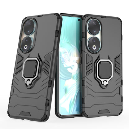 Black TPU phone case with magnetic ring holder and raised camera protection