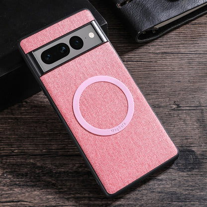 Pink fabric-texture phone case with light pink MagSafe magnetic ring on back