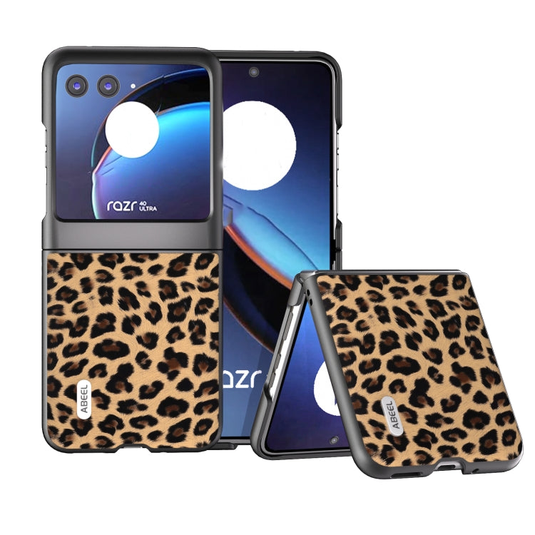 Leopard print phone case with black edges and built-in folding stand
