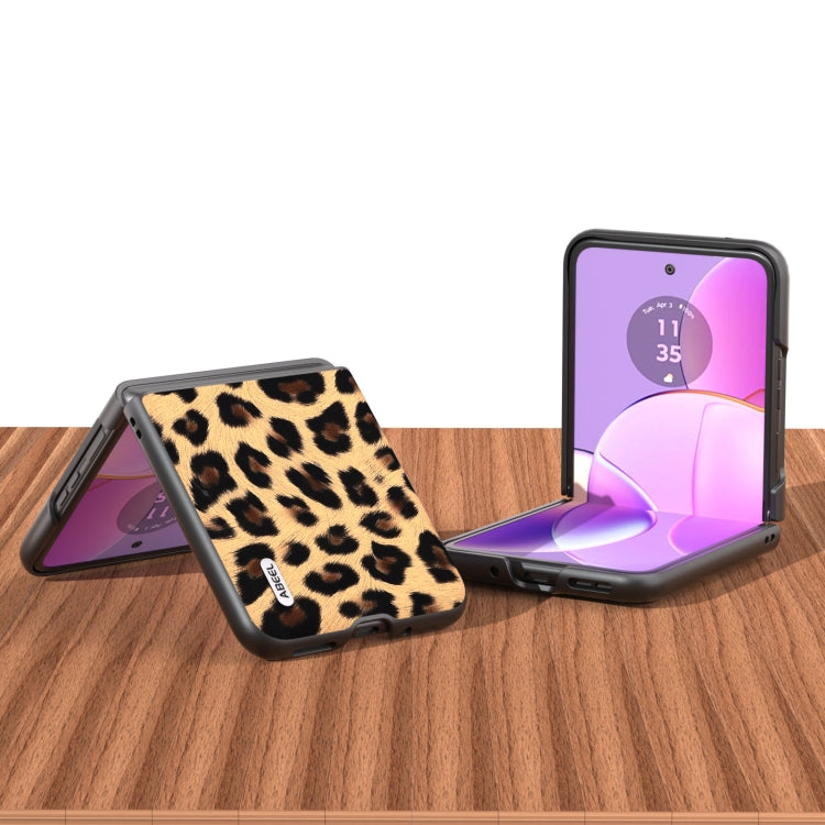Leopard print phone case with built-in folding stand and protective black edges