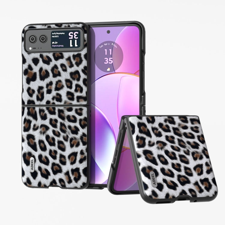 Leopard print phone case with black edge and built-in folding stand, double-layer look