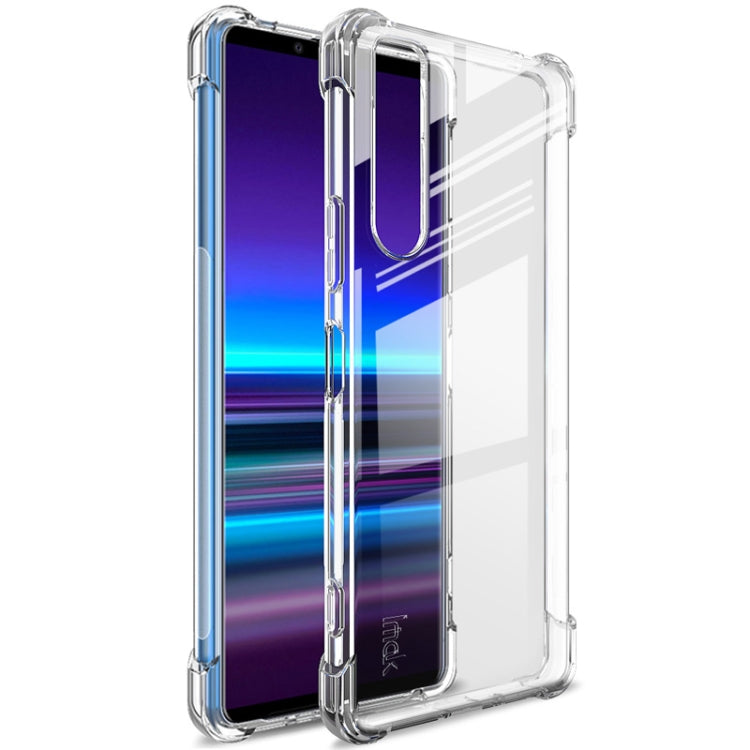Transparent TPU shockproof phone case with raised edges and camera cutout