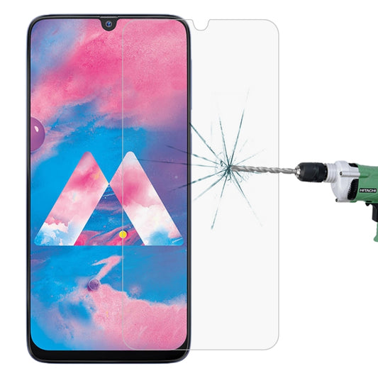 Tempered glass screen protector film with half coverage on a phone display