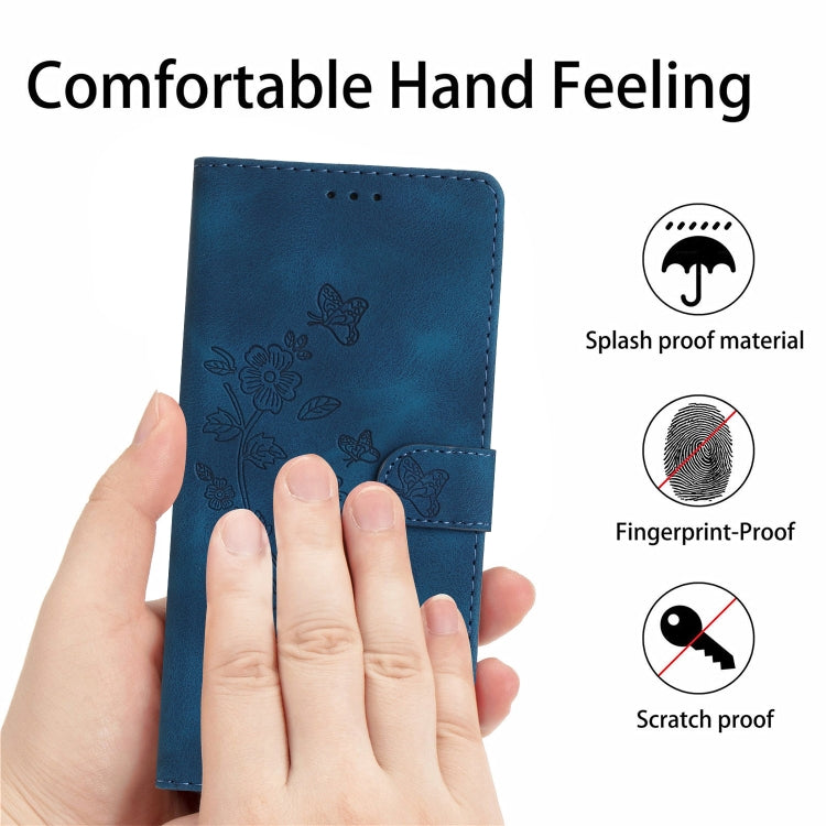 Blue leather-look flip phone case with embossed flowers and butterflies, held in hand