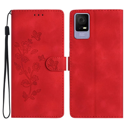 Red leather-look phone case with embossed flowers and butterflies, wrist strap and cutout