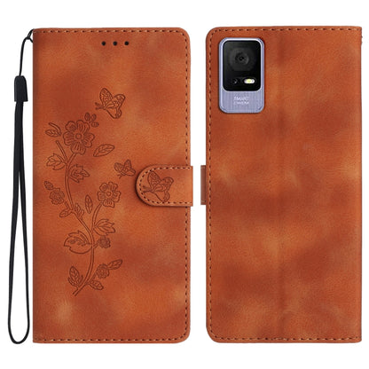 Brown leather-look flip phone case with embossed flowers and butterflies, wrist strap