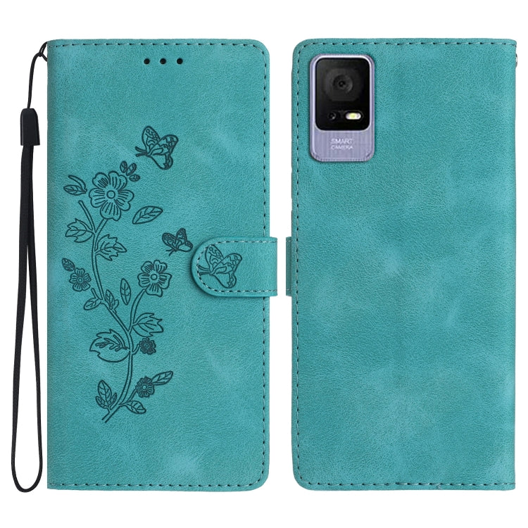 Turquoise leather-look phone case with embossed flowers and butterflies, wrist strap and cutout