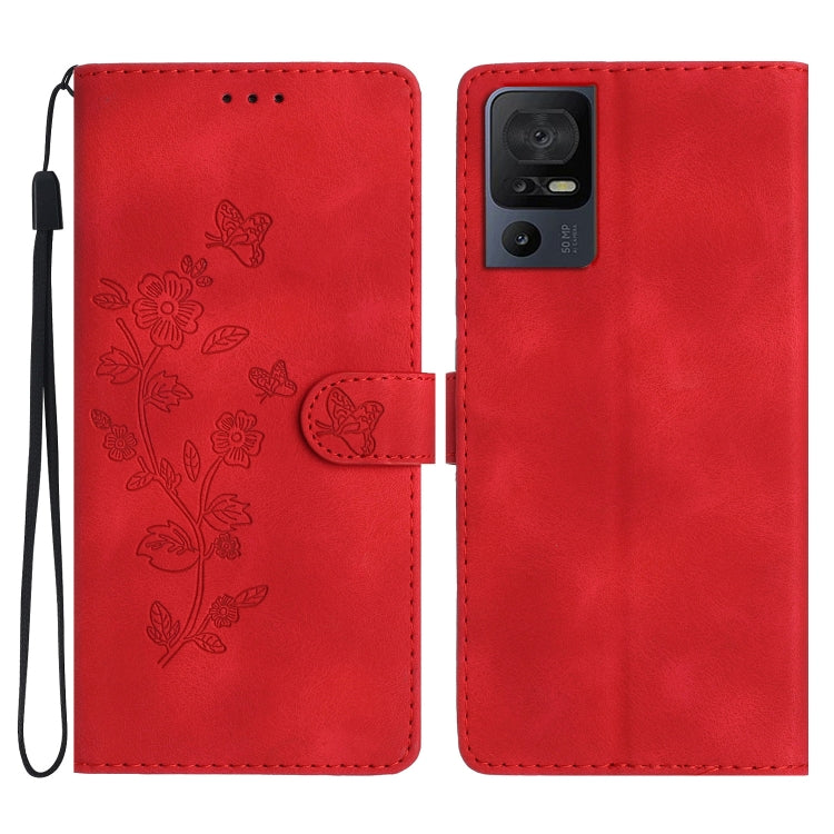 Red leather folio phone case with embossed butterfly and flower pattern, flip strap included