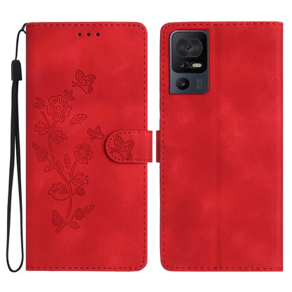 Red leather folio phone case with embossed butterfly and flower pattern, flip strap included