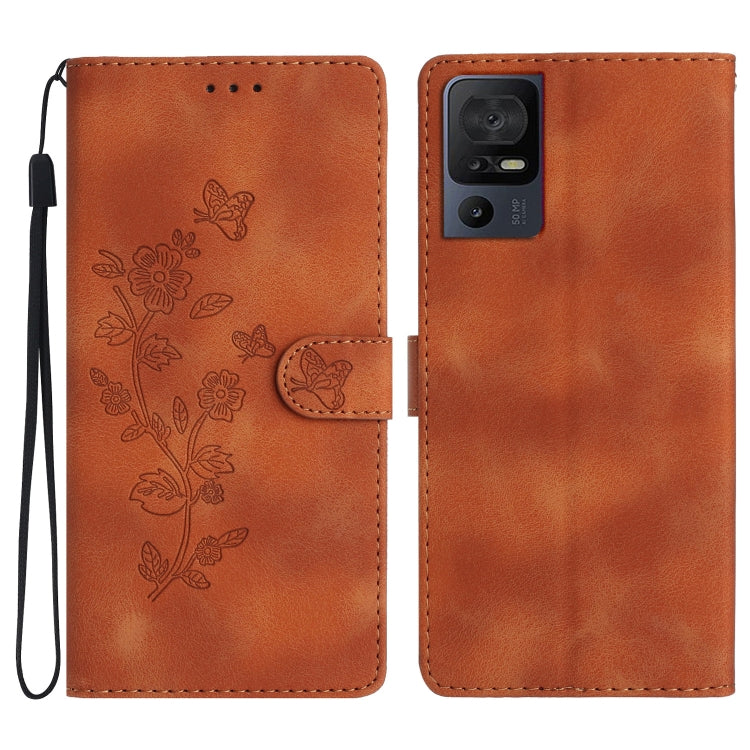 Tan leather folio phone case with embossed butterfly and flower pattern, flip strap included