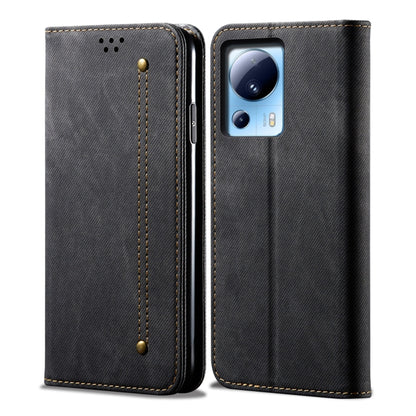 Dark flip phone case with denim texture and camera cutout, leather-look edges