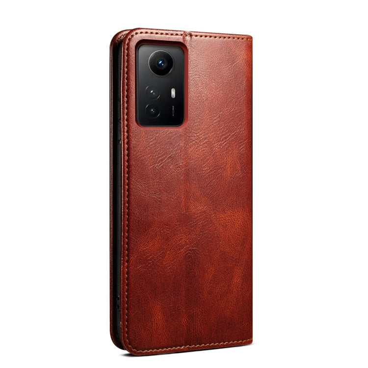Brown leather phone case with raised camera cutout and crazy horse texture finish