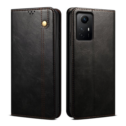 Black crazy horse leather phone case with camera cutout, perforation, and magnetic button
