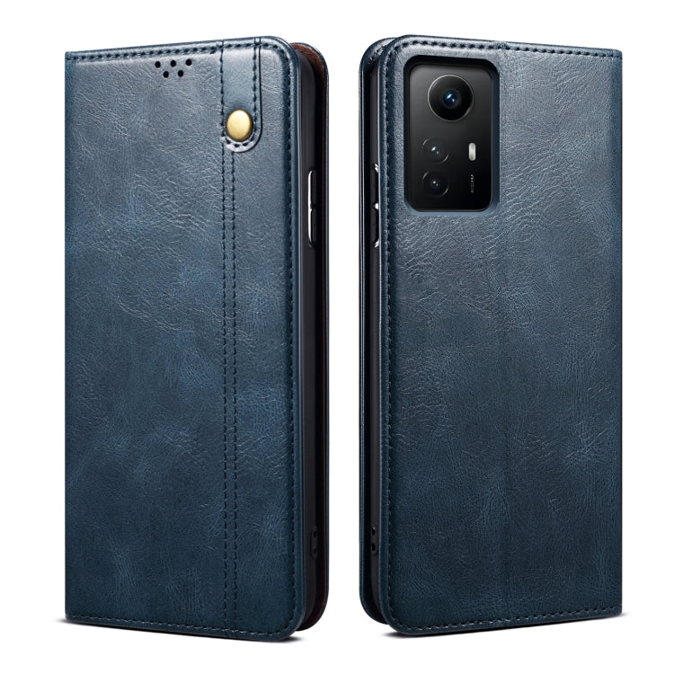 Blue crazy horse leather phone case with camera cutout, perforation, and magnetic button