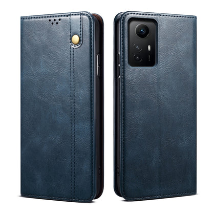 Blue crazy horse leather phone case with camera cutout, perforation, and magnetic button