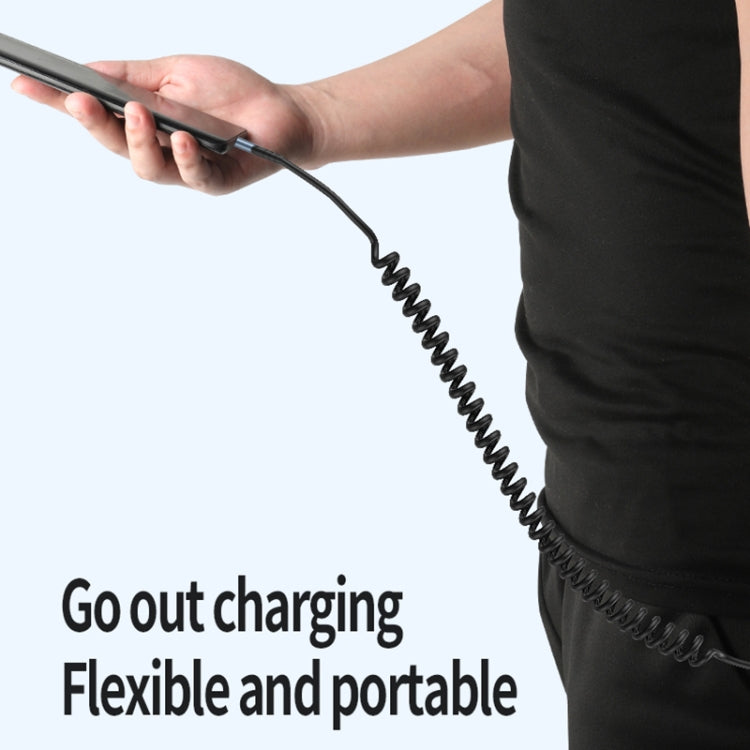 Flexible coiled charging cable with black spiral cord, compact and portable