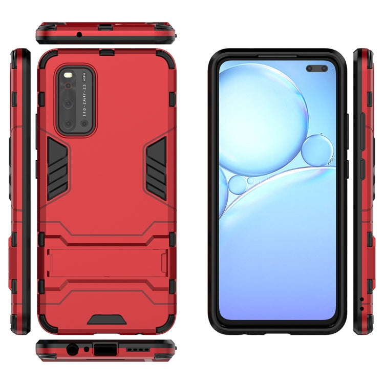 Red rugged phone case with hidden holder, raised edges and camera cutout