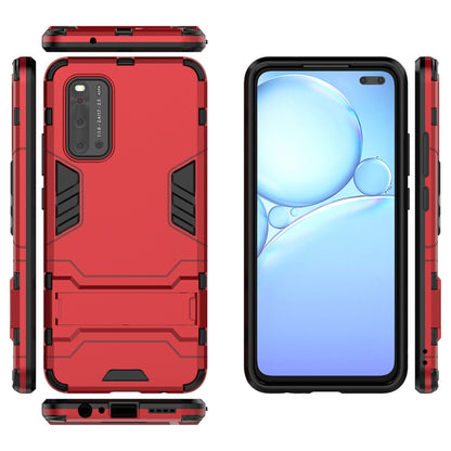 Red rugged phone case with hidden holder, raised edges and camera cutout