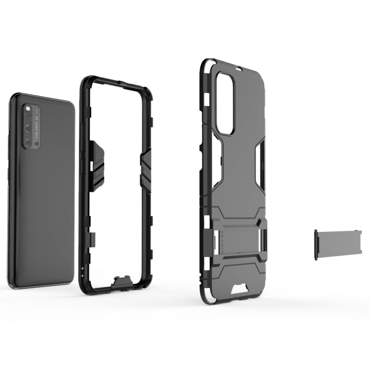Dark rugged protective phone case with side grips and hidden holder cutouts