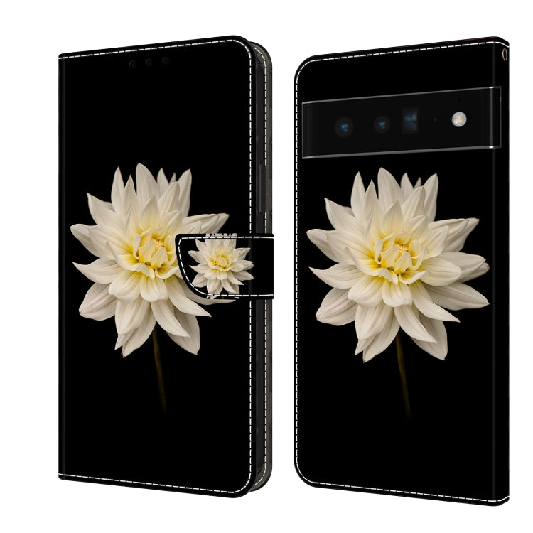 Leather phone case with white flower and small matching accent on a dark background