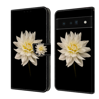 Leather phone case with white flower and small matching accent on a dark background