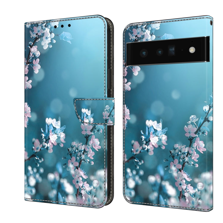 Leather phone case with pastel blue floral blossoms and dreamy light bokeh dots