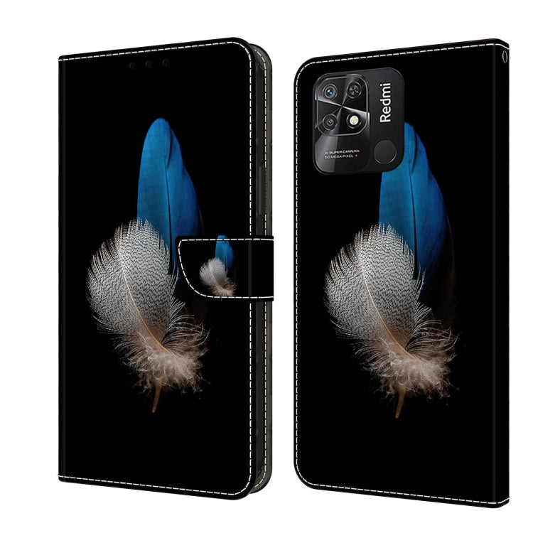 Leather-look flip phone case with blue and silver feather design