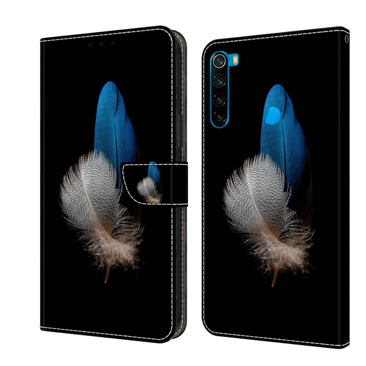 Leather phone case with black background, blue and silver feather wings, magnetic flip cover