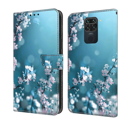 Flip phone case with light blue floral sprig pattern in pink and white blossoms