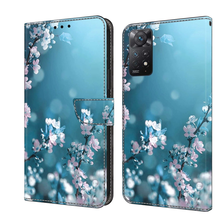Protective leather phone case with blue background and pink floral branch design