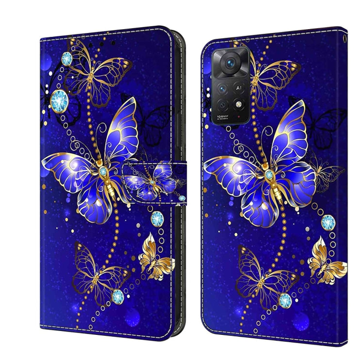 Blue leather phone case with jeweled butterfly design and folio-style cover