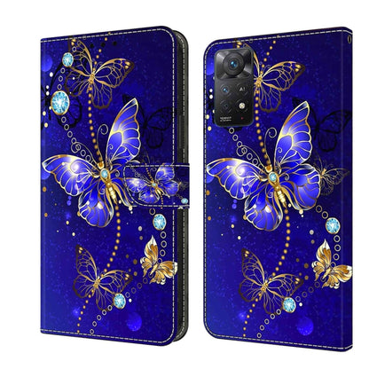 Blue leather phone case with jeweled butterfly design and folio-style cover