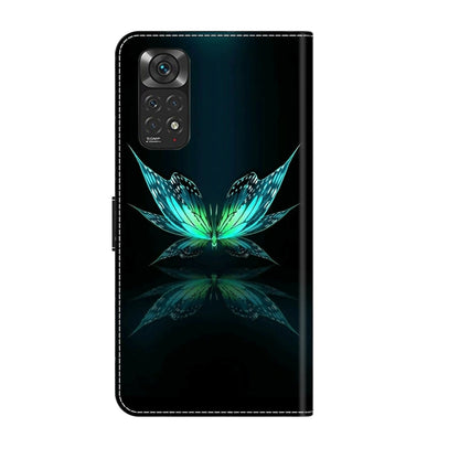Dark blue leather-look phone case with teal butterfly flower and mirrored reflection
