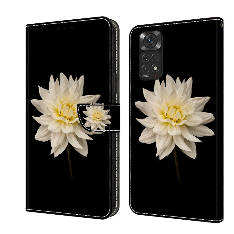Black leather folio phone case with white daisy flower and small petal detail
