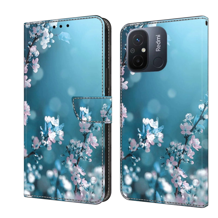 Light blue wallet phone case with pastel floral blossom pattern and snap strap