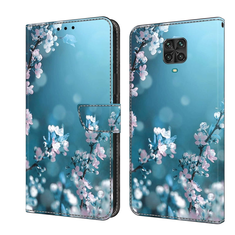 Flip phone case with light blue background and cherry blossom branch print