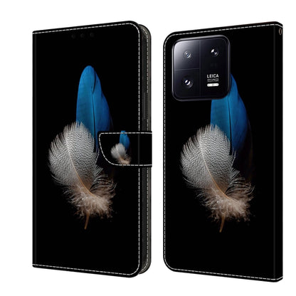 Crystal-style shockproof phone case with black leather-look body and blue feather flower art