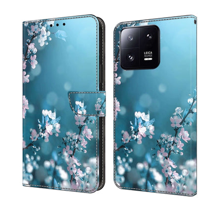 Crystal-style shockproof phone case with light blue background and pink cherry blossom branches