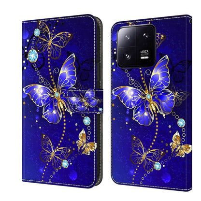 Blue leather wallet phone case with butterfly and gem crystal floral pattern