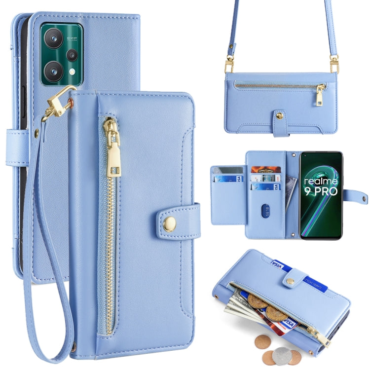 Light blue leather cross-body phone wallet with zip, card slots, and wrist strap