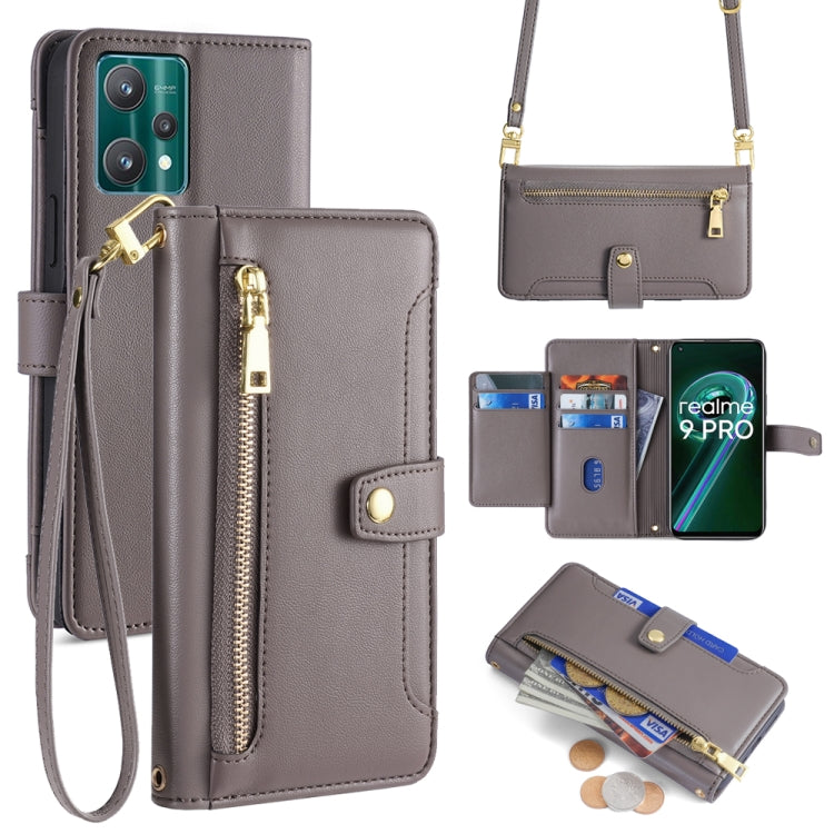 Gray leather cross-body phone wallet with zip, card slots, and removable wrist strap