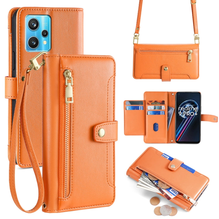 Orange leather cross-body phone wallet with front zipper, card slots, and wrist strap
