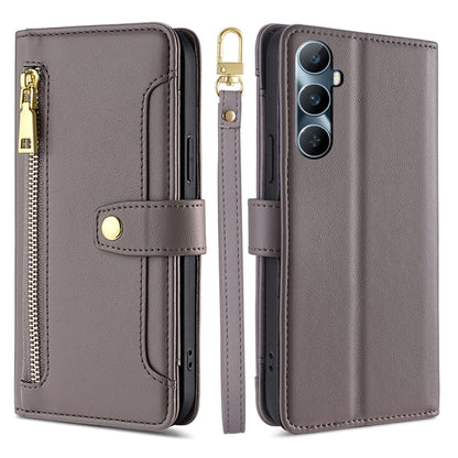 Dark gray cross-body zipper wallet phone case with front card slot and wrist strap.