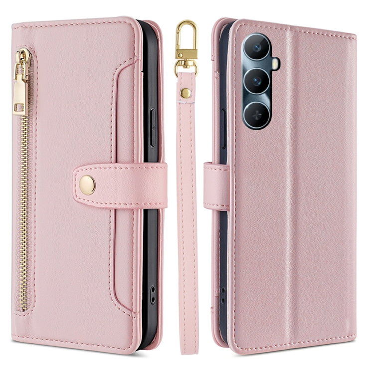 Light pink cross-body zipper wallet phone case with front card slot and wrist strap.