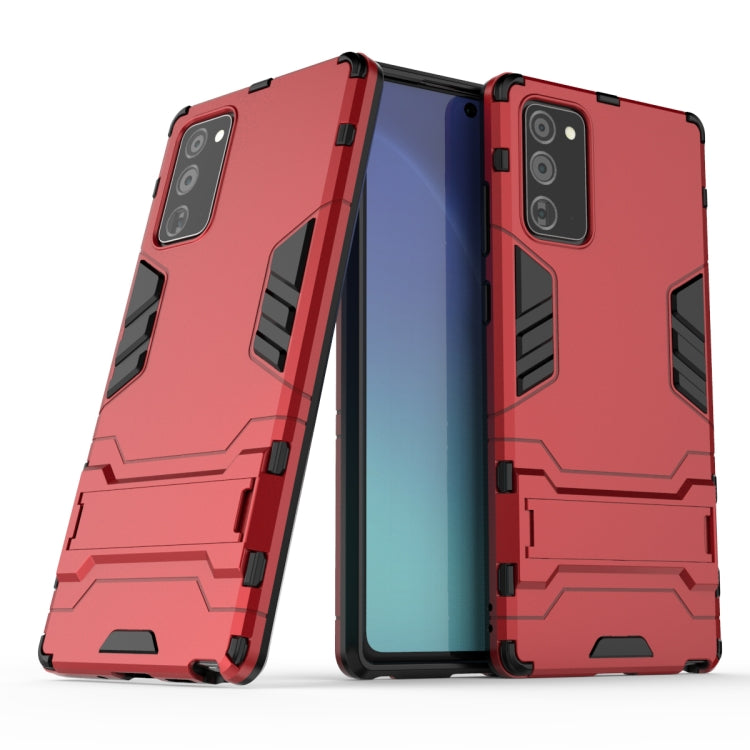 Red rugged shockproof phone case with holder, raised camera guards, dual-layer armor