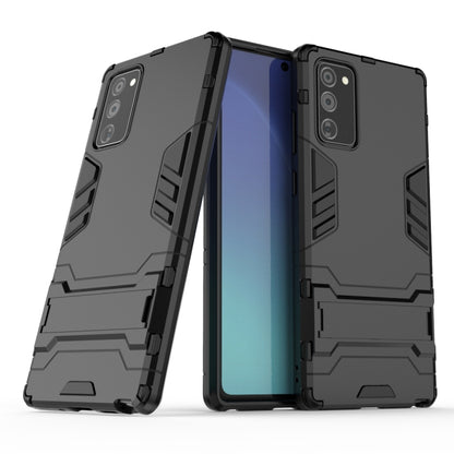 Dark gray rugged shockproof phone case with holder, raised camera guards, dual-layer armor