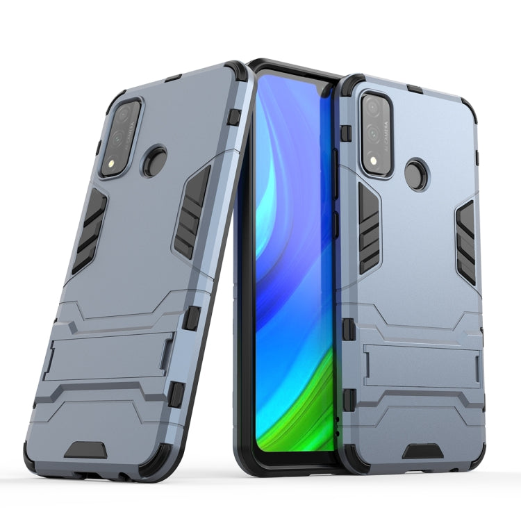 Light blue-gray armored phone case with black borders, front and back views
