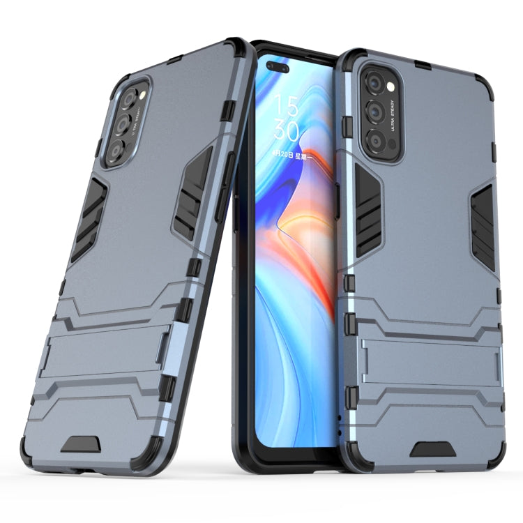 Navy rugged shockproof phone case with holder, raised camera guards, dual-layer armor